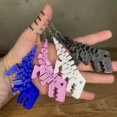KIT Chaveiro dinossauro articulado varias cores