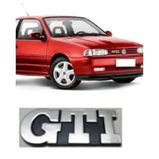 EMBLEMA GTI GOL PARATI SAVEIRO VOYAGE SANTANA  TODOS  CINZA ESCOVADO COM FUNDO PRETO