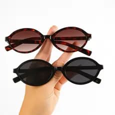 Óculos de Sol Feminino Oval Tartaruga Retrô – Lente Escura + Estojo Moderno