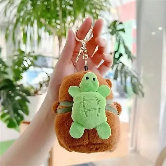 Chaveiro de Pelúcia Capivara Musical Toque Com Musica Mochila Tartaruga, Animal de Pelúcia