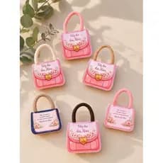 KIT COM 50 LEMBRANCINHA BOLSINHA DIA DAS MÃES XUXINHA DE CABELO MIMO BOLSA MÃE