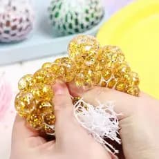 Brinquedo de desabafo de bola de uva de descompressão Bolas de cristal em pó de ouro