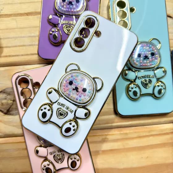 Capa Capinha Samsung A07 / A17 / A56 / A15 / A16/ A26 / A36/ A37/ A06 com Suporte Ursinho 3D Anti Impacto Feminina Luxo