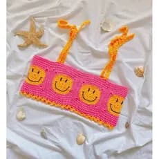 Top cropped de crochê Smile