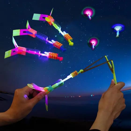 Brinquedo Voador Rotativo Helicoptero Led Foguete Lançador Estilingue Luminoso Criança 1