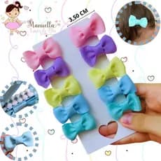 Kit com 10 Mini Laços para bebês – presilha forrada com fita e borrachinha antideslizante para maior segurança.