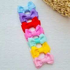 Kit 7 ou 8 Lacinhos Bebê Infantil Coloridos com Bico de Pato Encapado e Borrachinha Antideslizante.