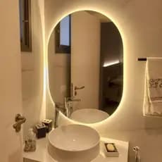 Espelho Oval LED 40x50 cm com Botão Touch para Banheiro Lavabo Penteadeira Quarto Sala Decorativo