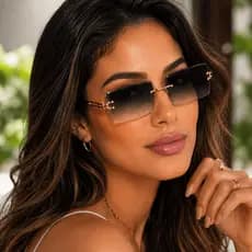 Óculos de Sol Feminino Sem Aro Estilo Blogueira Fashion Lente Retangular Proteção UV400 Luxo Novidade 2025