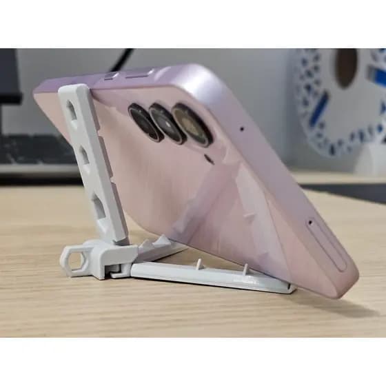 Suporte Dobrável para Celular com Braços Automáticos – Ajustável e Portátil