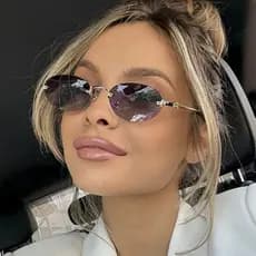 Moda novo estilo Oval sem moldura exclusivo óculos de sol Anti-ultravioleta retrô feminino 2025 cor gradiente festa de c