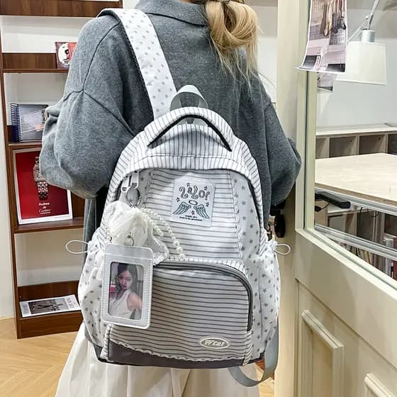 Nova Mochila Feminina Estilo Coreano Listrada Estrela Grande Capacidade Mochila Leve Versátil Simples Sensação de Alta Q