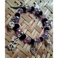 PULSEIRA DE PROTEÇÃO CRISTAL 8MM POMBA GIRA ROSA CAVEIRA , ROXO COM PRETO