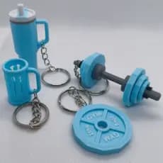 Chaveiros Academia Fitness: Haltere, anilha, mini copo térmico e mini porta lata energético