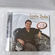 CD- SANDRO BECKER = SÓ DEUS CALA A MINHA VOZ =AS 20 MAIS ( USADO) LEIA A DESCRIÇÃO
