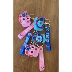 Chaveiro Stitch Mini Câmera Surpresa com Projeção Colecionável