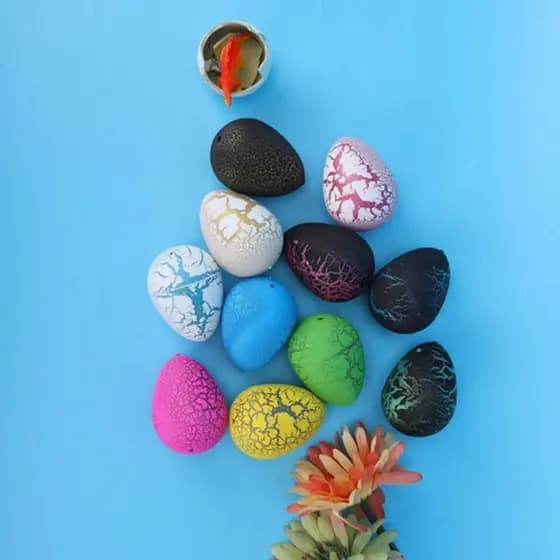 Brinquedo Ovo de Dinossauro Escama de plástico Com Surpresa Dentro