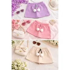 Roupa Infantil Menina Juvenil Short Saia Feminina Com Bolsos e Detalhes Pom Pom Conforto e Estilo Moda Verão
