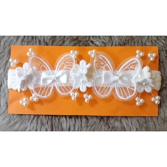Tiara faixinha de bebê jardim encantado e batizado de borboletas com flores na cor branco.