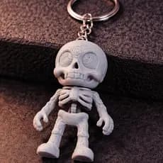 Chaveiro Caveira Articulada Mini Esqueleto com Argola Resistente Presente Criativo
