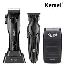 KIT Maquinas Profissonais Kemei Original Maquina de Cortar Cabelo + Acabamento + Shaver - BIVOLT