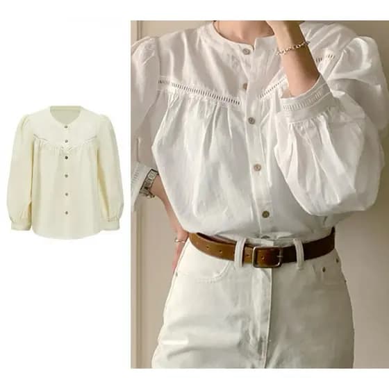 Camisa branca com botões e detalhes