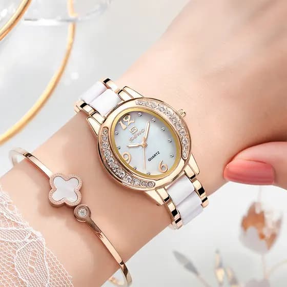 Novo relógio feminino, design oval elegante, cravejado de diamantes, relógio de quartzo à prova d'água para mulheres.