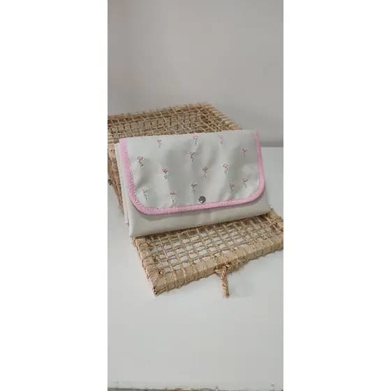 Trocador portátil para bolsa