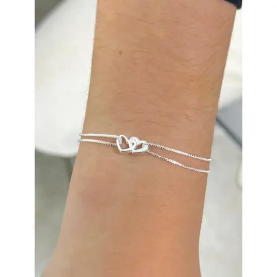 Pulseira corações entrelaçados banhada à prata 925