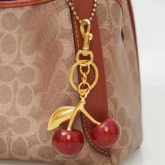 Cross-Border venda quente europeu americano moda cereja carro chaveiro High-End sentimento cerejas saco pingente requint
