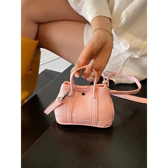 Bolsa feminina 2026 novo estilo Mini bolsa de jardim bolsa mensageiro de ombro padrão de seixo bolsa pequena