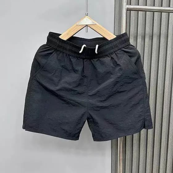 2026 novo estilo respirável Shorts de secagem rápida masculino verão fino Casual moda na moda solto esportes praia calça