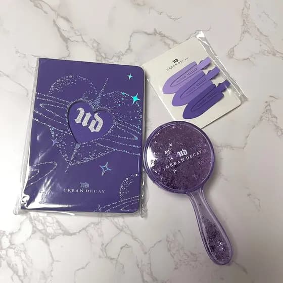 Ud roxo Popular pente massagem almofada de ar pente portátil espelho de maquiagem Notebook periférico portátil pincel de