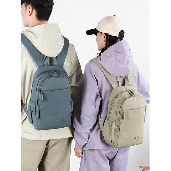 Cor sólida estilo simples mochila masculina leve descompressão mochila saco de escola Tablet Multi-bolso Commuter viagem