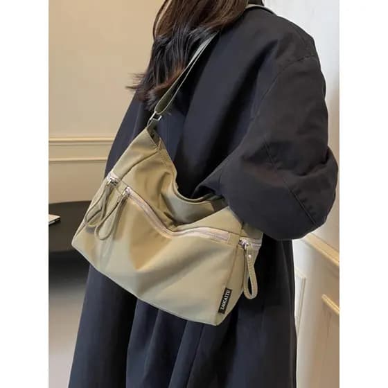 Alça de ombro larga moda mensageiro saco de pano de grande capacidade 2024 novo estilo na moda INS bolsa de ombro temper