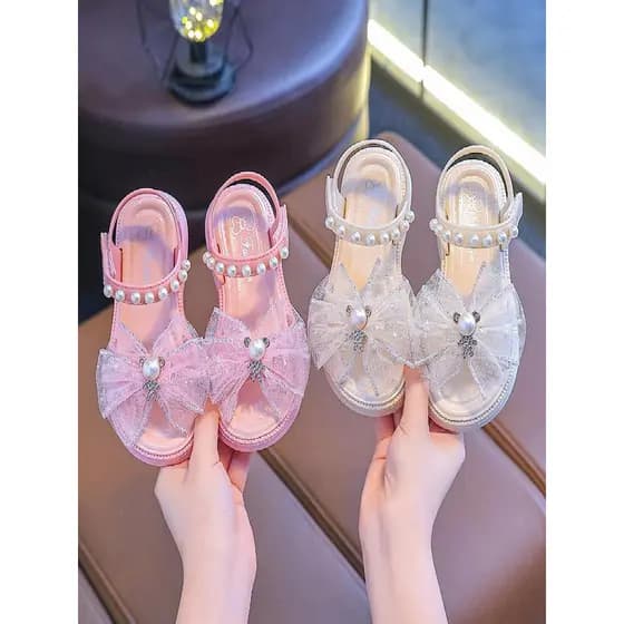 Meninas sandálias verão novo estilo 2026 sapatos de praia de sola macia sapatos infantis antiderrapantes meninas princes