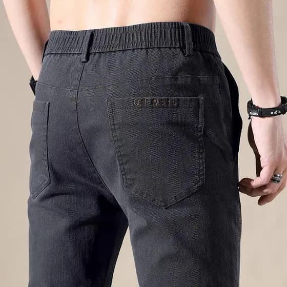 2025 primavera calças casuais masculinas versão coreana na moda jovem de meia-idade fino ajuste reto estiramento All-mat
