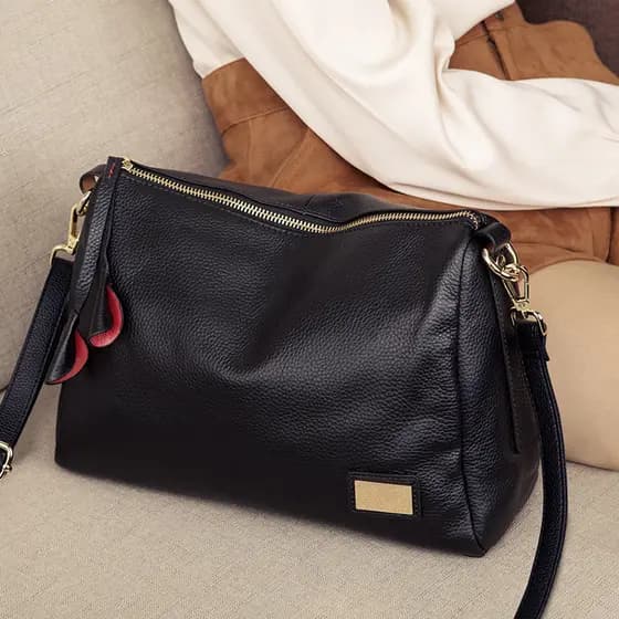 Bolsa feminina 2025 novo estilo na moda moda bolsa de ombro de couro genuíno feminino atmosférico All-Match borla primei