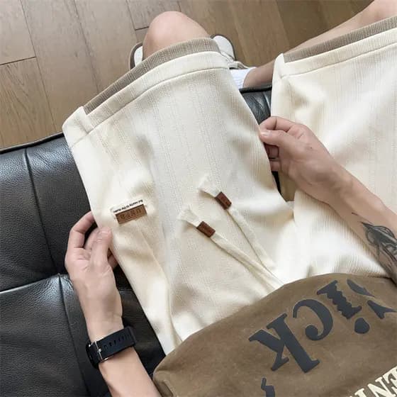 Falso de duas peças Shorts de seda gelo masculino verão 2024 novo estilo solto Casual calças médias Street wear exterior