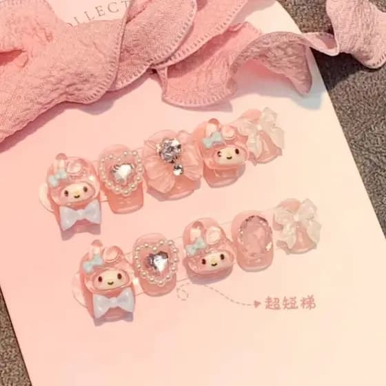 Conjunto de 10 peças de unhas postiças artesanais da Sanrio, pintadas à mão em rosa suave, estilo francês My Melody, com
