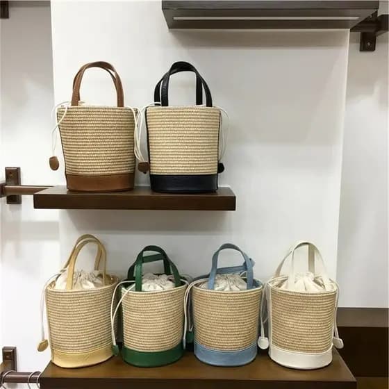 bolsa femenina Bolsa Bolsa feminina 2025 novo estilo High-End férias palha tecido saco cilindro portátil Cross-corpo bal