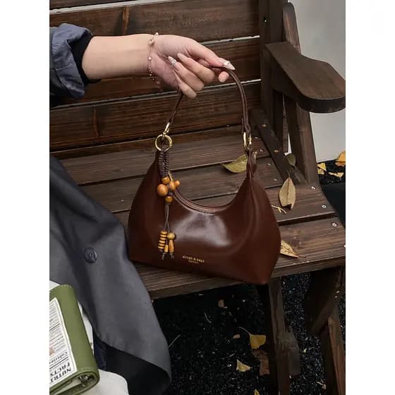 Bolsa bolsa transversal feminino High-End Retro portátil bolsa de ombro feminina 2026 verão novo estilo nicho Commuter a