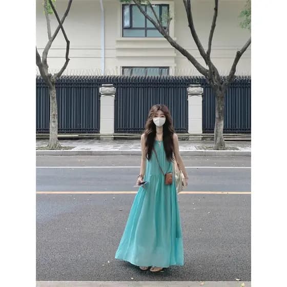 Seaside férias estilo oco estilingue saia longa vestido feminino verão Design sentir plissado solto grande bainha saia A