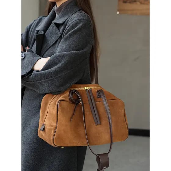 2026 saco de boliche de couro fosco 2025 novo estilo luz luxo couro genuíno axilas Baguette saco Commuter All-Match bols