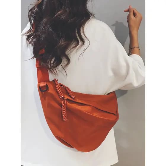 Bolsa de lona feminina 2026 novo estilo bolsa de peito de grande capacidade Casual Cross-Body bolinho saco esportes viag