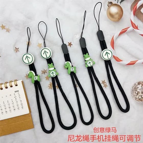 Criativo segurando código verde cordão do telefone móvel corda de pulso resistente ao choque bonito dos desenhos animado