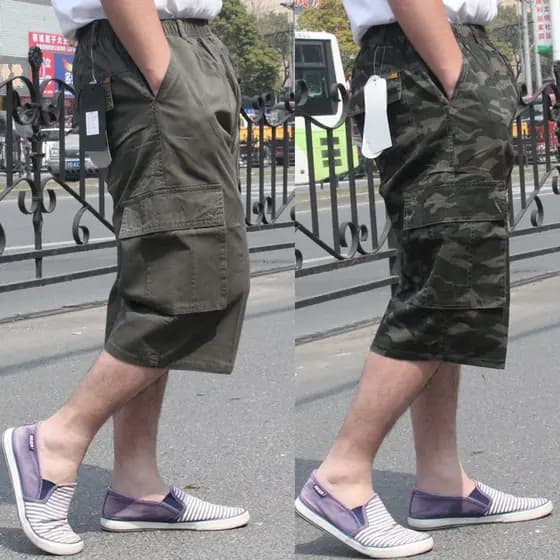 Roupas masculinas de verão novo estilo versão coreana calças cortadas masculinas casuais na moda Shorts de 7 pontos solt
