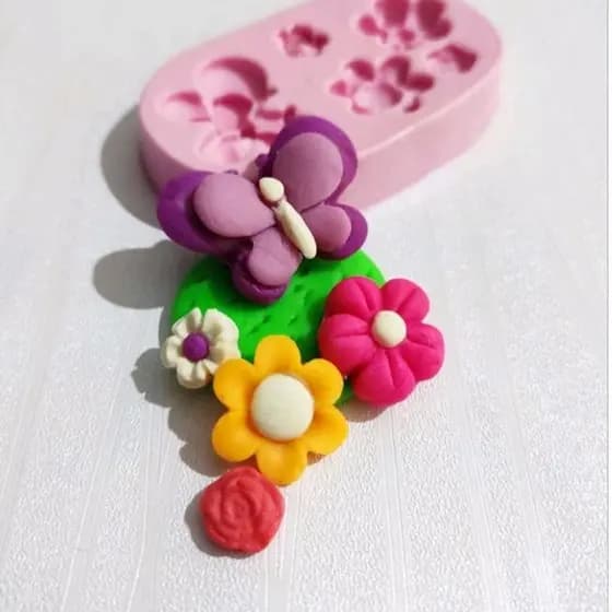 Molde de silicone - Molde 1 borboleta c/ 4 flores diferentes.