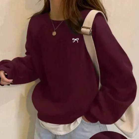 Moletom casual de cor sólida, gola redonda com estampa de laço.