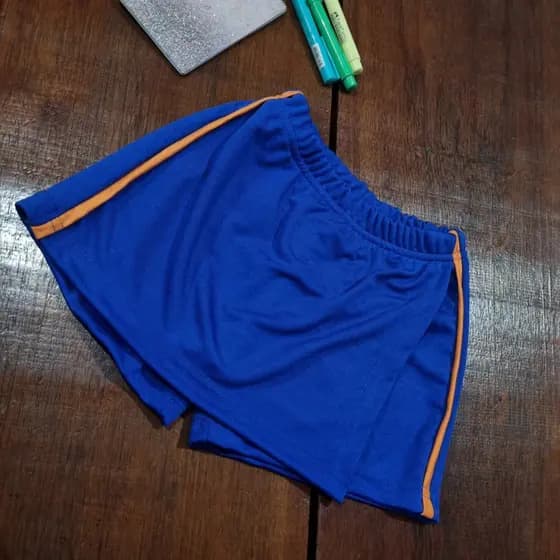 Schort saia escolar helanca royal com frizo laranja. Infantil e juvenill.